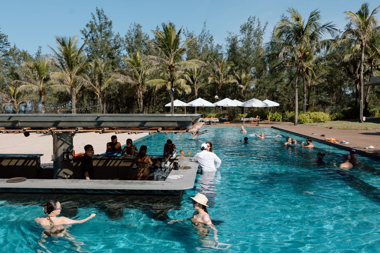 Luxury beach club interior in Vietnam, minimalist design with Mediterranean fusion